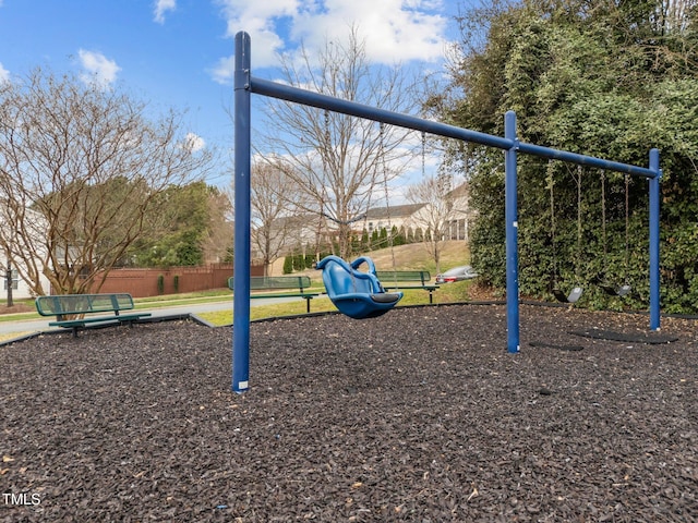 community jungle gym with fence