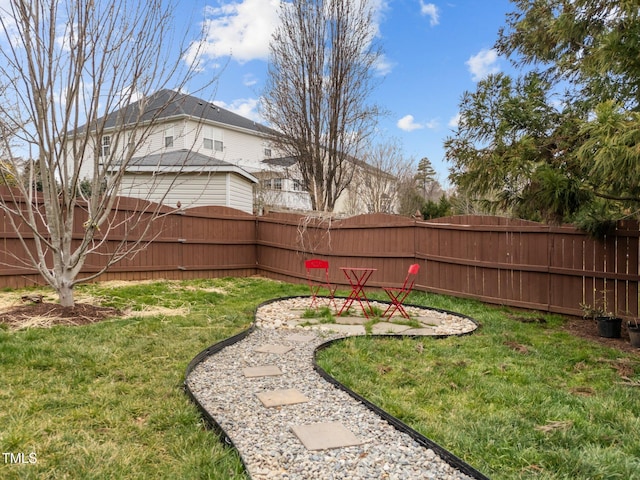 view of yard with fence