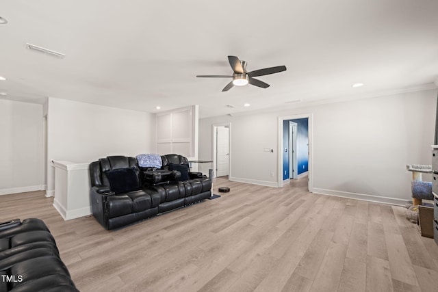 living room with recessed lighting, a ceiling fan, visible vents, baseboards, and light wood-type flooring