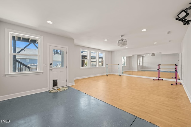 exercise room with visible vents, baseboards, and recessed lighting