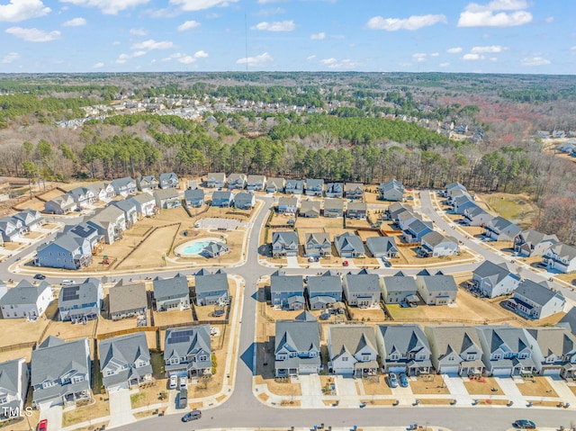 birds eye view of property with a residential view