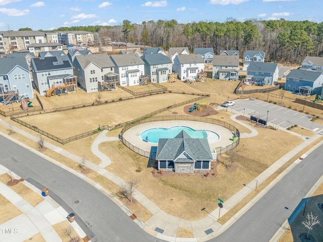 birds eye view of property with a residential view