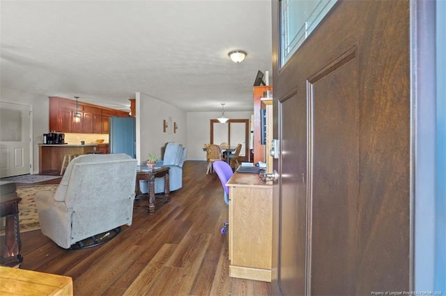 living area with dark wood-type flooring