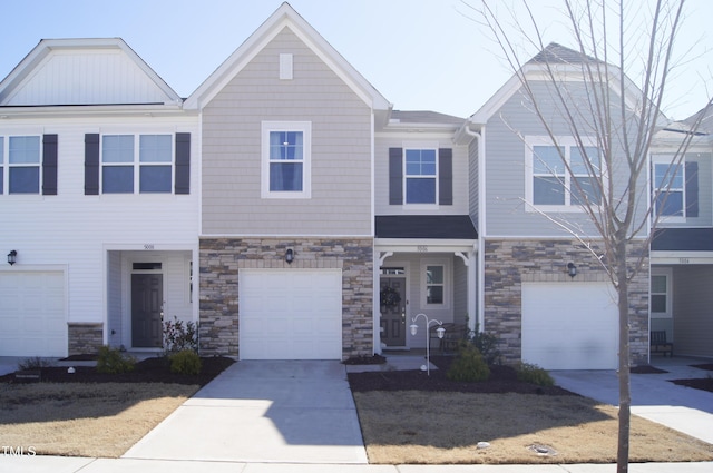 5006 Tura St, Raleigh, NC 27610 - townhome / multi-family property with a garage and driveway