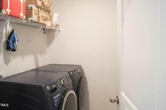 laundry area with washer and dryer and laundry area