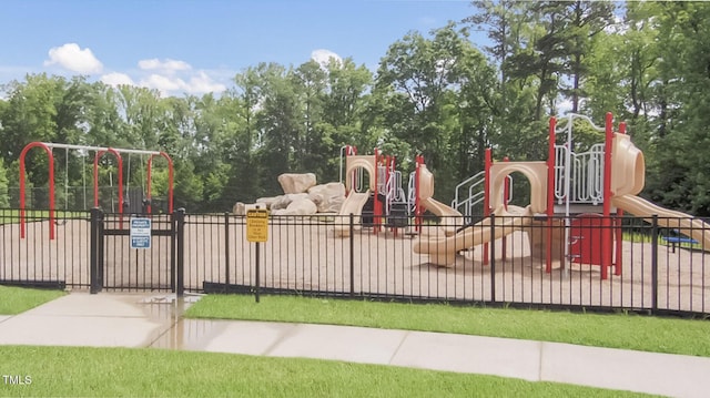 community jungle gym with fence