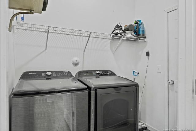 laundry area with laundry area and washer and dryer