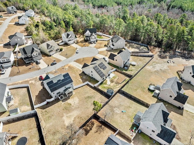 birds eye view of property with a residential view