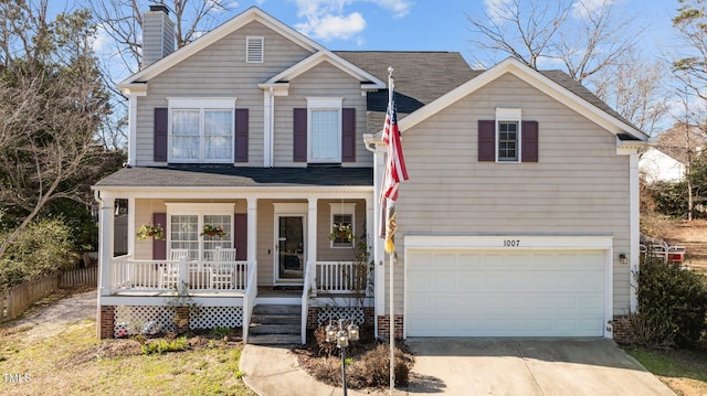 traditional home featuring an attached garage, covered porch, concrete driveway, roof with shingles, and a chimney