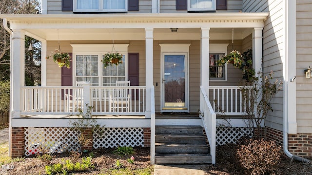 entrance to property with covered porch