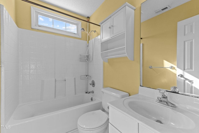 bathroom with visible vents, toilet, bathtub / shower combination, a textured ceiling, and vanity