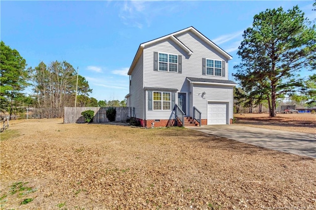 traditional home with a garage, crawl space, fence, and concrete driveway