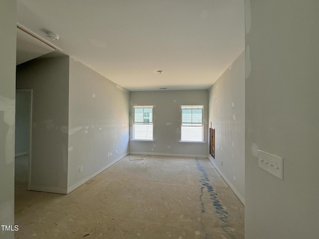 247 Meadowbark Bnd Unit 29, Garner, NC 27529 - unfurnished room with a smoke detector and baseboards