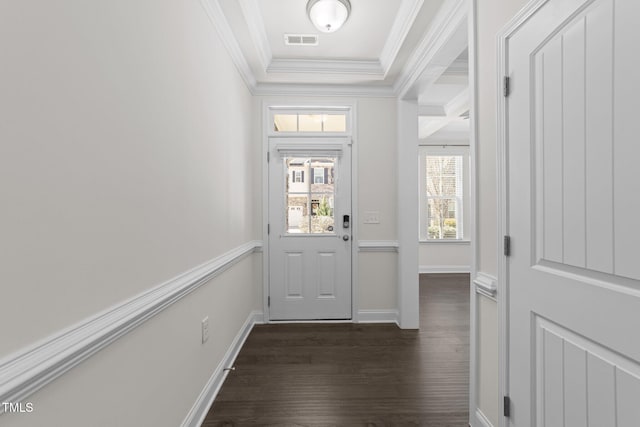 entryway featuring visible vents, baseboards, ornamental molding, and dark wood-style flooring