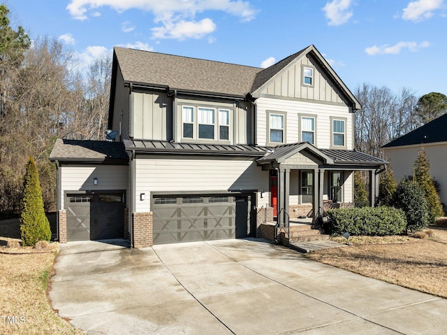 modern farmhouse style home featuring driveway, a standing seam roof, a garage, board and batten siding, and brick siding