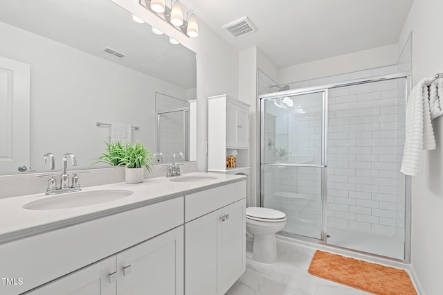 full bath featuring a stall shower, a sink, and visible vents