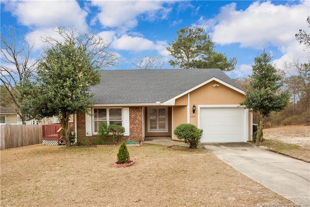 ranch-style home featuring brick siding, a shingled roof, fence, a garage, and driveway