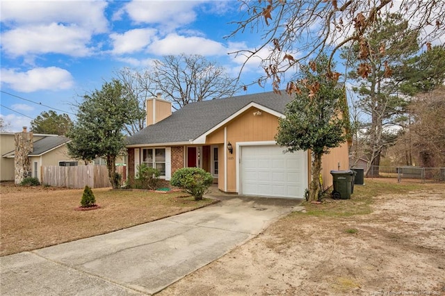 ranch-style house featuring brick siding, a chimney, fence, a garage, and driveway