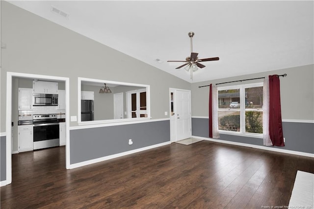 unfurnished living room featuring lofted ceiling, ceiling fan with notable chandelier, dark wood-style flooring, visible vents, and baseboards