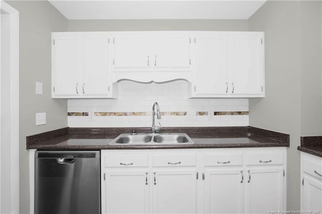 kitchen with a sink, tasteful backsplash, white cabinets, and dishwasher