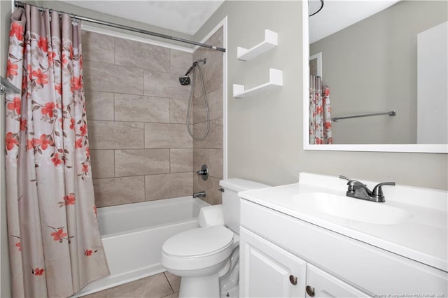 full bath featuring toilet, tile patterned flooring, shower / bath combination with curtain, and vanity