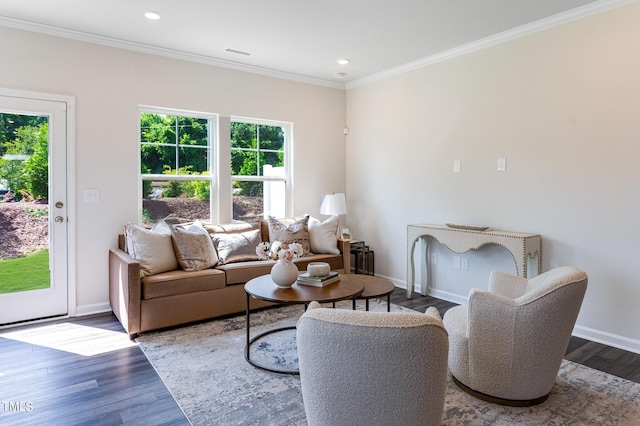 living area with recessed lighting, wood finished floors, visible vents, baseboards, and ornamental molding