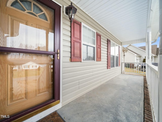 doorway to property featuring a porch