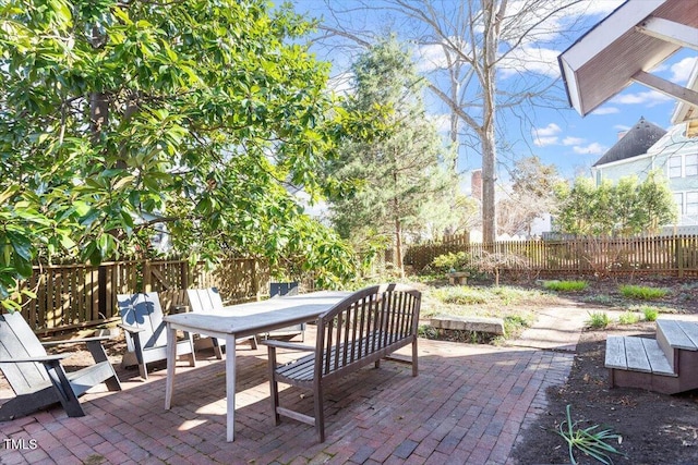 view of patio / terrace with fence and outdoor dining space