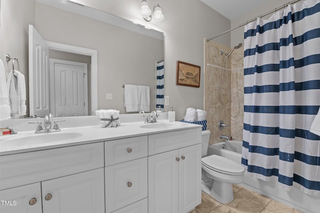 full bath with a sink, shower / bath combo with shower curtain, toilet, and double vanity