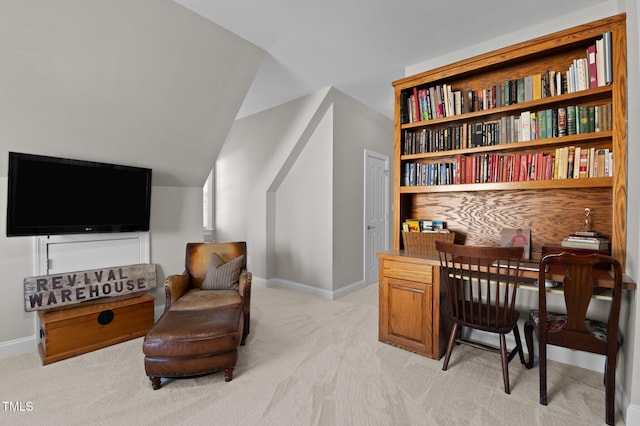 home office with light carpet and baseboards