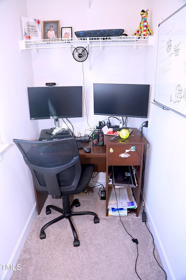 office area with carpet flooring and baseboards