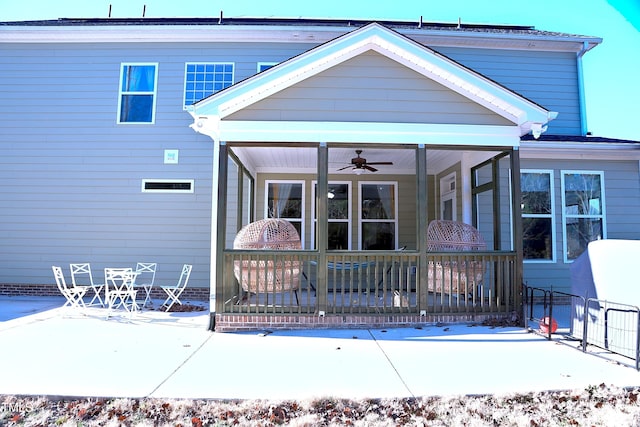 back of house featuring a patio area and a ceiling fan