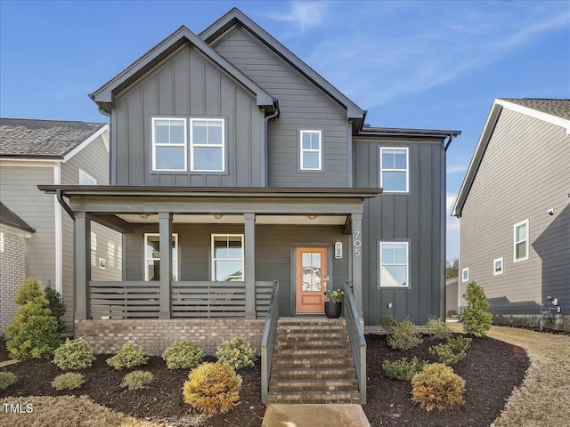 view of front of home with a porch and board and batten siding