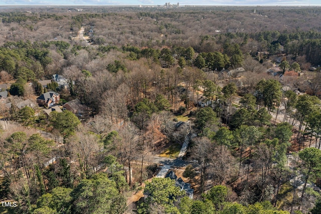 bird's eye view with a view of trees