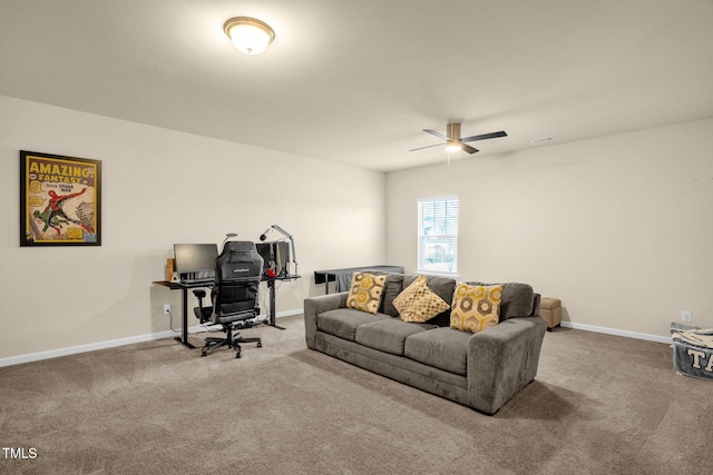 living room with carpet, a ceiling fan, and baseboards