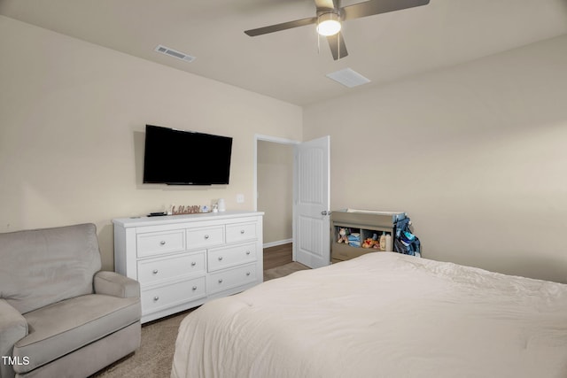 bedroom with ceiling fan and visible vents