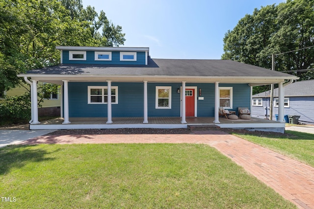 view of front of home featuring covered porch and a front yard