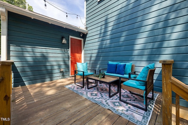 deck featuring outdoor lounge area