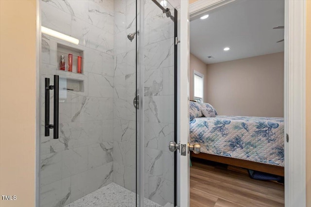 full bathroom with connected bathroom and a marble finish shower