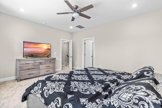 bedroom with carpet floors, recessed lighting, visible vents, and baseboards