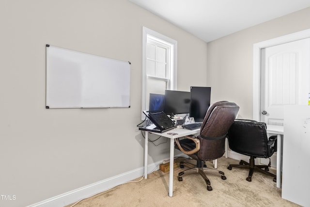 home office featuring carpet floors and baseboards