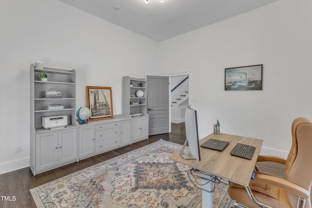 office featuring dark wood-type flooring and baseboards