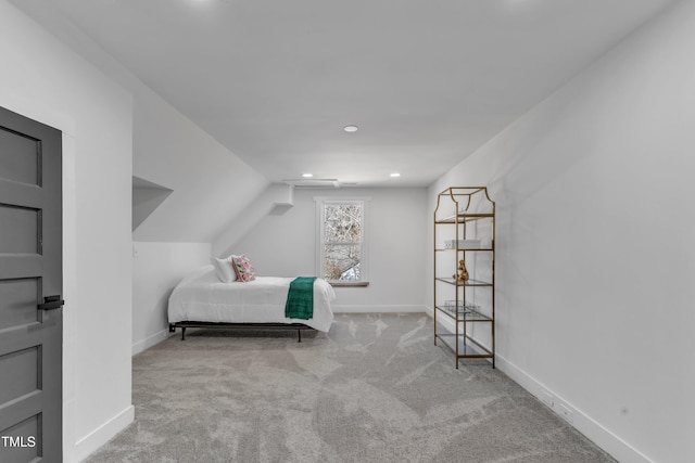 bedroom featuring lofted ceiling, carpet floors, recessed lighting, and baseboards