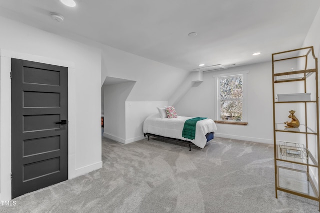 carpeted bedroom with lofted ceiling, baseboards, and recessed lighting