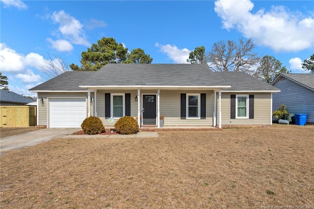 ranch-style house featuring a garage, concrete driveway, fence, a porch, and a front yard