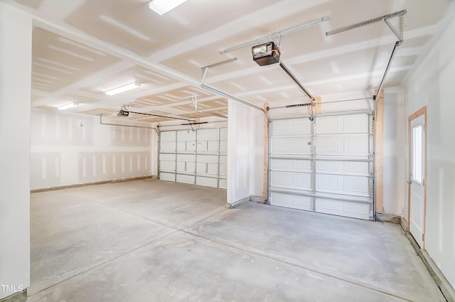 garage featuring a garage door opener