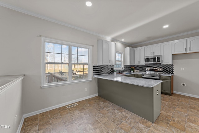 kitchen with a peninsula, white cabinetry, visible vents, appliances with stainless steel finishes, and tasteful backsplash