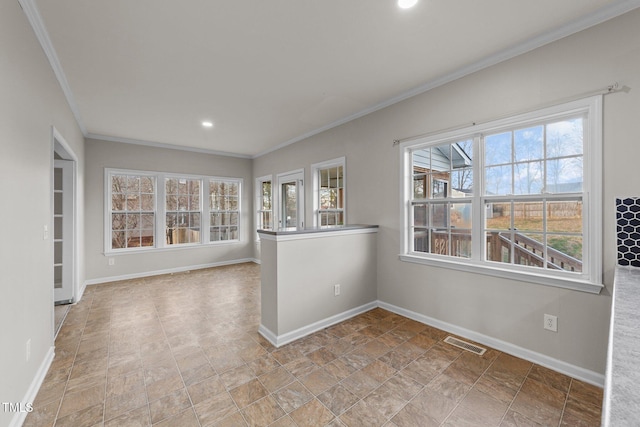 empty room featuring crown molding, recessed lighting, visible vents, and baseboards