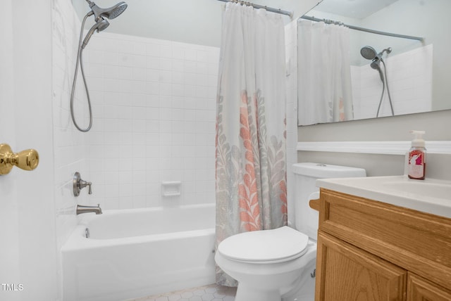 bathroom with shower / tub combo with curtain, vanity, and toilet