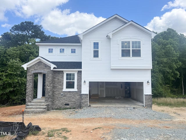 212 Fast Pitch Ln, Four Oaks, NC 27524 - view of front of home featuring stone siding, a garage, driveway, and roof with shingles